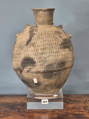 Lot 264 - A Chimu grey pottery flattened ovoid vase...
