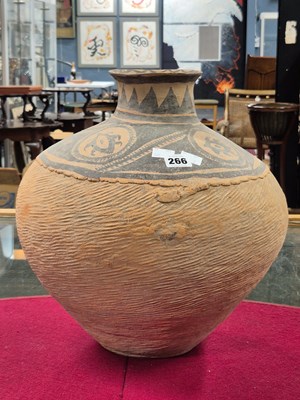 Lot 266 - A Neolithic Chinese terracotta vase decorated...