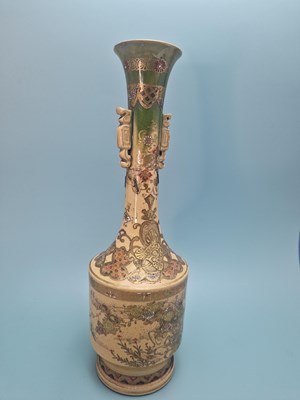 Lot 269 - A Satsuma two handled bottle vase with a green...