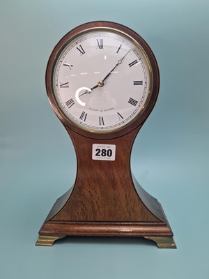 Lot 280 - A mahogany balloon cased timepiece with an...