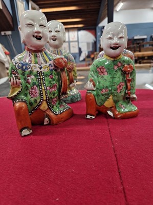 Lot 289 - Four figural incense holders each man on one...