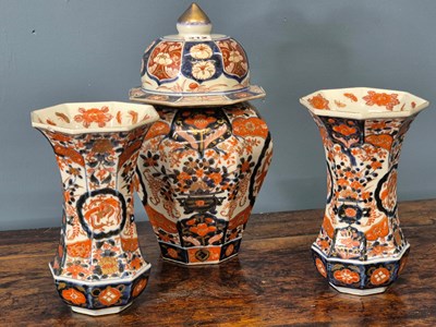 Lot 312 - A pair of Japanese Imari octagonal waisted...