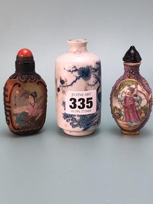 Lot 335 - Three Chinese snuff bottles, one of interior...