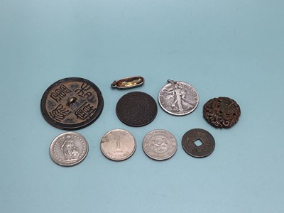 Lot 339 - A 1934 American half dollar pendant, a 1988...