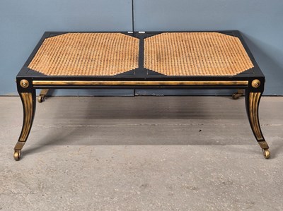 Lot 344 - A Thomas Hope style black and gilt caned top...