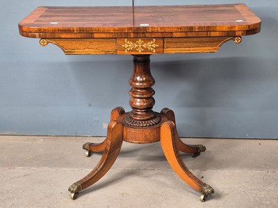 Lot 345 - A 19th century cross banded rosewood swivel...