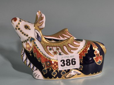 Lot 386 - A Royal Crown Derby paperweight figure of a...