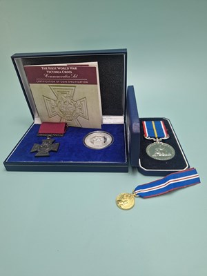 Lot 443 - A cased 1950's National Service medal awarded...