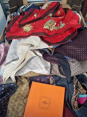 Lot 1607 - A collection of silk scarves and cravats