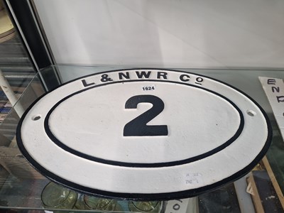 Lot 1624 - A L & NWR cast iron oval plaque numbered 2