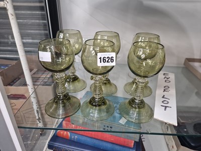 Lot 1626 - Six green hock glasses of roemer shape...