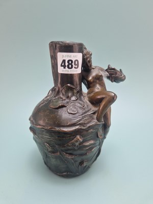 Lot 489 - A late 19th century bronze water themed bottle...