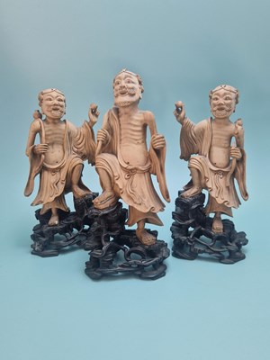Lot 492 - Three Chinese blond wood figures of Daoist...