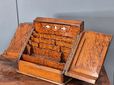 Lot 496 - A late Victorian oak stationary box, the...