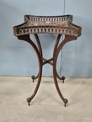 Lot 498 - A mahogany occasional table, the galleried...