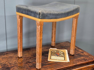Lot 499 - An Elizabeth II oak coronation stool, a...