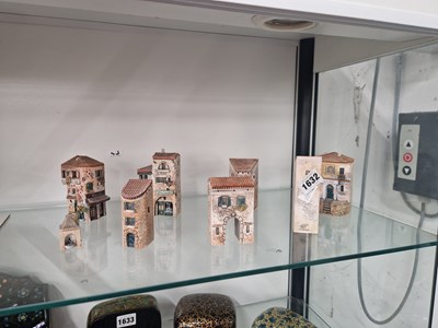 Lot 1632 - Eight Gault pottery model houses