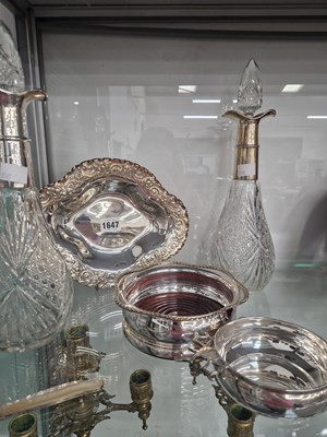 Lot 1647 - A pair of silver mounted decanters, a silver...