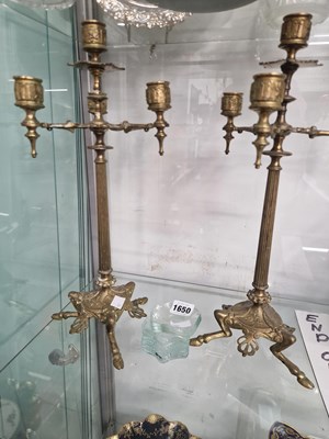 Lot 1650 - A pair of ormolu four light candelabra
