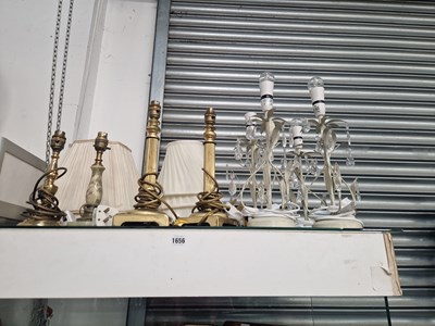 Lot 1656 - A set of four table lamps hung with glass...