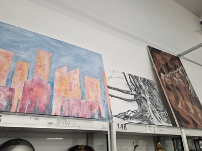 Lot 1684 - Three abstract oil paintings of skyscrapers,...