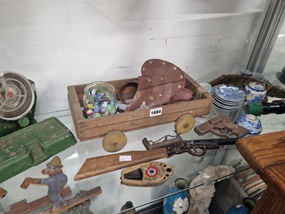 Lot 1694 - Toy guns, glass marbles, a child's blue and...