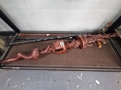 Lot 1709 - Two antler handled walking sticks, an ornately...