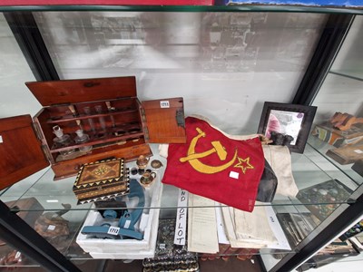 Lot 1711 - A test tube cabinet, a USSR flag, a mirror, an...