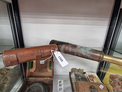 Lot 1723 - A leather cased four draw telescope together...