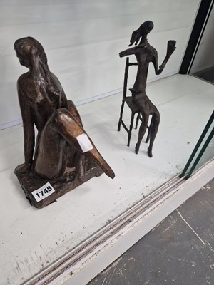 Lot 1748 - A bronze seated nude together with a bronze...