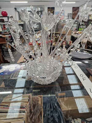 Lot 1767 - A glass bowl of clear glass flowers