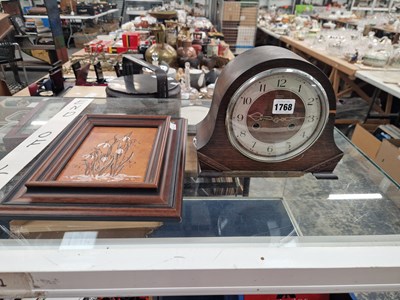 Lot 1768 - A Smiths oak cased mantle clock striking on a...