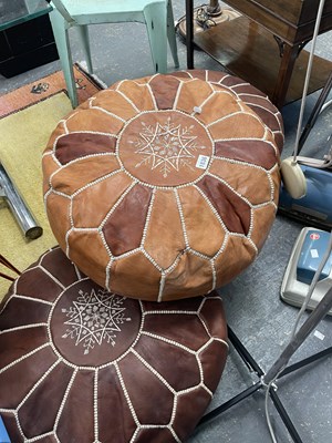 Lot 1836 - Three leather pouffes with ornamental white...