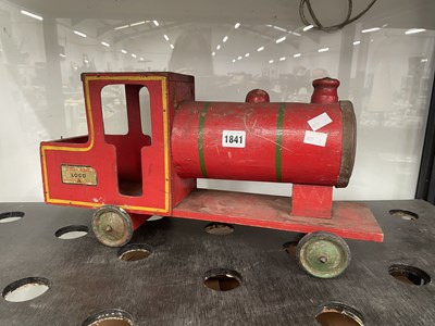 Lot 1841 - A Triang red painted wood loco on rubber tyred...