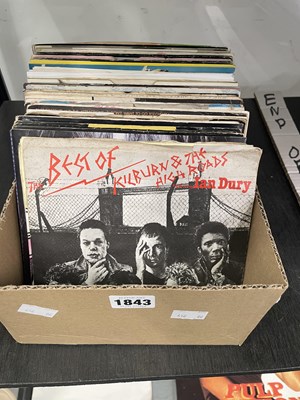 Lot 1843 - A collection of 45rpm single records: Ian Dury,...