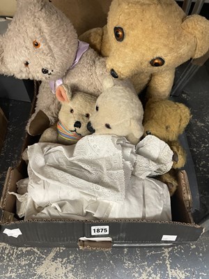 Lot 1875 - Five teddy bears together with christening gowns