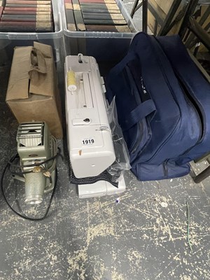 Lot 1919 - A Joy's electric sewing machine together with...