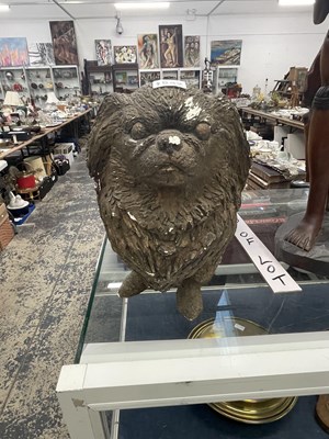 Lot 1942 - A life size gilt plaster model of a Pekinese