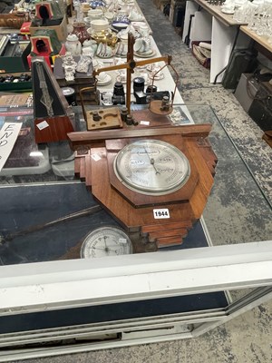 Lot 1944 - An aneroid barometer, a metronome and a set of...
