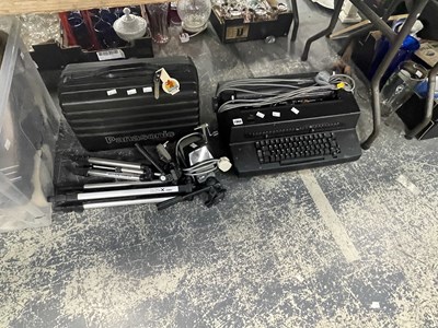 Lot 1960 - A cased Panasonic VHS movie camera, tripods, a...