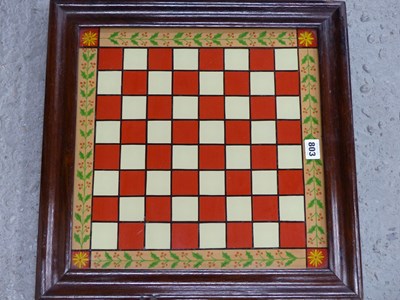 Lot 803 - A rosewood framed reverse decorated glass...