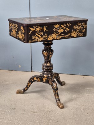 Lot 847 - A Chinese black lacquer sewing table. the...