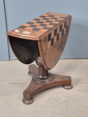 Lot 856 - A chess board inlaid walnut coffee table, the...