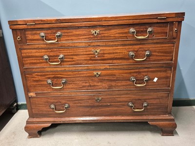 Lot 867 - A 19th century mahogany flap topped chest of...