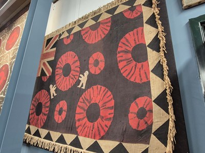 Lot 869 - A textile panel printed with red circles on a...