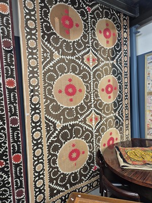 Lot 872 - A susani stretched on a wooden frame...