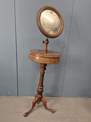 Lot 881 - A Victorian walnut shaving mirror adjustable...