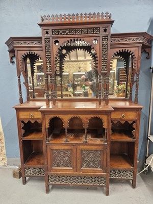 Lot 883 - A Liberty & Co. mahogany mirror-backed cabinet...
