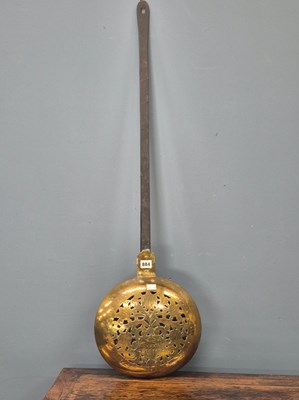 Lot 884 - An 18th century brass warming pan, the lid...
