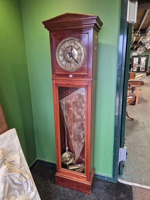 Lot 890 - An Arts and Crafts mahogany long cased two...